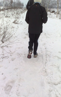 Läufer auf hartgefrorenem Schnee