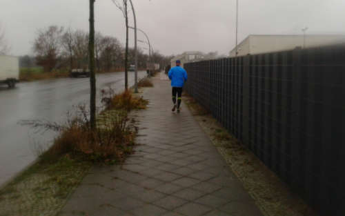 Läufer im Nieselregen